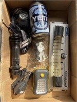 Yeti collectibles can, LED flashlights, LP gas
