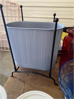 Waste basket with holder