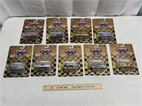 9 New in Package Racing Champion Toy Cars