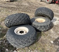 Set of 4 implement tires and 8 lug rims