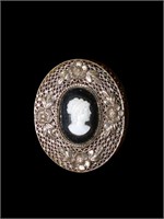Vintage silver-toned cameo brooch pin. Made in
