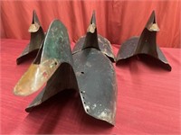 Four vintage metal duck decoys. Approx. 15 inch L