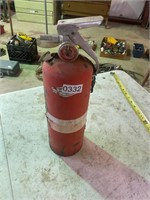 Charged fire extinguisher