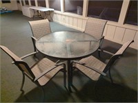 Outdoor glass top round table & 4 chairs