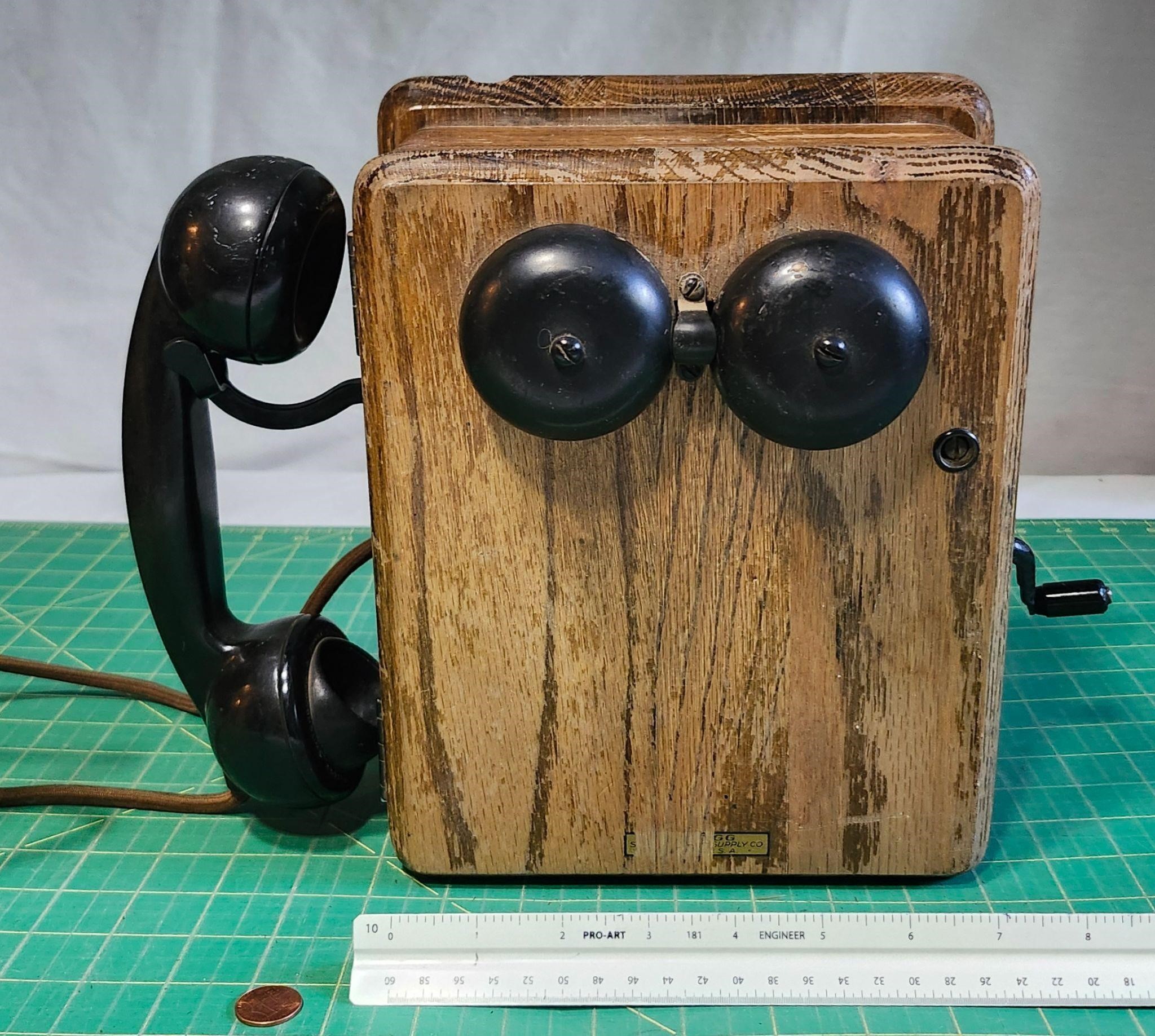 Antique Kellogg oak wall mount phone