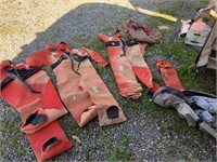 Large lot with survival suits with bags