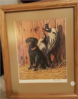 Framed print of black lab and duck decoys