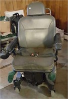 Electric wheelchair with seat belt, horn