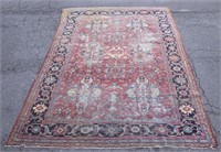 A Persian Afshar rug.