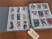 Binder of 1991 Upper Deck hockey cards