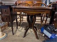 Single pedestal antique Table