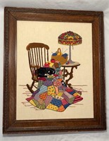 NEEDLEPOINT OF A CAT SNUGGLED ON A ROCKING CHAIR