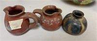 Three Signed Pottery Pitchers and Vase