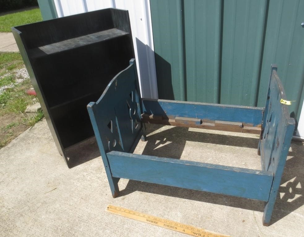 Blue painted old bed, shelf