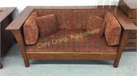 Mission oak love seat with cushions and pillows
