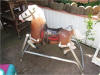 vintage spring jumping horse .