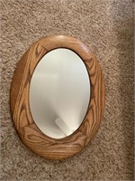 Wall mirror measuring 24 inches tall 17 1/2