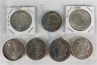 Morgan, peace, Eisenhower silver dollars seven