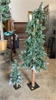 2 pre-lit Christmas trees