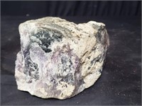 Raw amethyst crystal rock specimen,