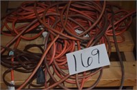 PILE OF EXTENSION CORDS