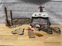 Vintage kitchen utensils, bread warmer, bear