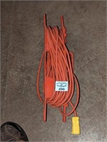 Orange extension cord on reel
