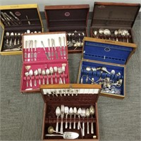 Wooden silverware chests with flateware