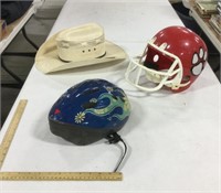 2 helmets w/ cowboy hat