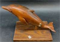 Wood carving of a dolphin on a nice wood base 7" x