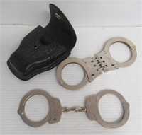 (2) Pair of Handcuffs with (1) Leather Holder