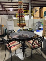 Patio table, four chairs and umbrella