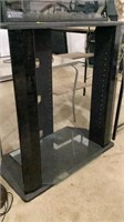 Tv stand with glass shelf, 30”x32”