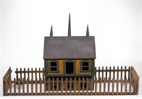 FOLK ART CARVED AND PAINTED HOUSE, with a central