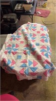 Quilt folded in half to show design