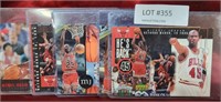 APPROX 5 LARGE MICHAEL JORDAN TRADING CARDS