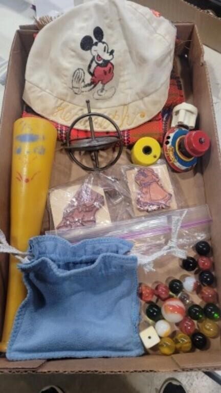Marbles, mickey hat, tops , bat and more