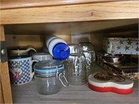 Contents of upper corner kitchen cabinet.  Coffee