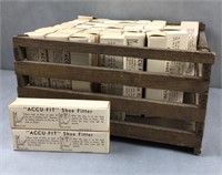 Accu fit shoe fitters in a wood crate