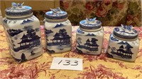 Four Oriental design ceramic canisters.