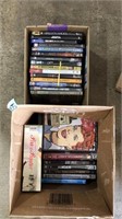 2 BOXES OF DVDS