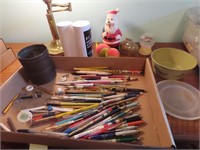 Advertising pens, pencils, rubber Santa, pig bank.