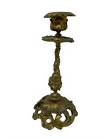 Intricate brass single candle stick holder