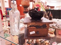 Vintage blob-top bottles and wooden coffee