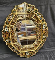 Vintage mirror in reverse-painted gilt wood