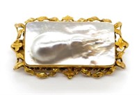 Blister pearl and gold pendant / brooch
