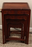 SET OF FOUR CHINESE WOODEN NESTING TABLES