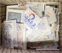 Worldwide Stamps hundreds mint and used in glassin
