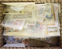 Worldwide Stamps hundreds mint and used in glassin