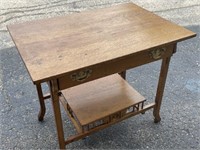 Antique table with modern handles, drawer is